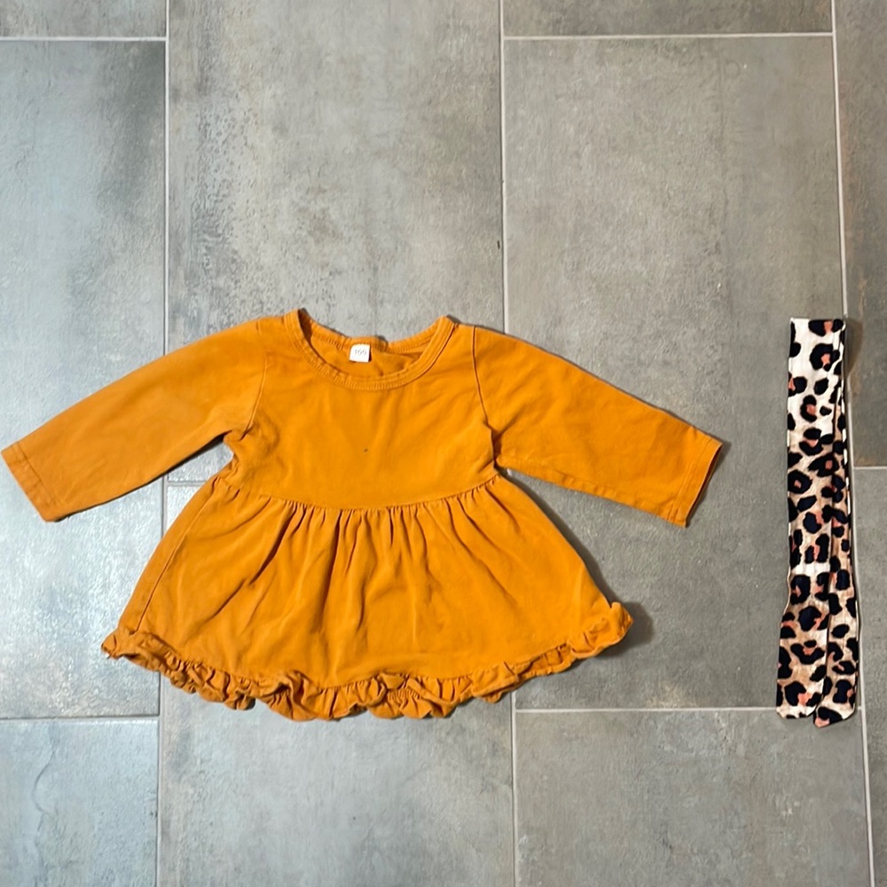 Gold ruffled toddler top with leopard print headband.